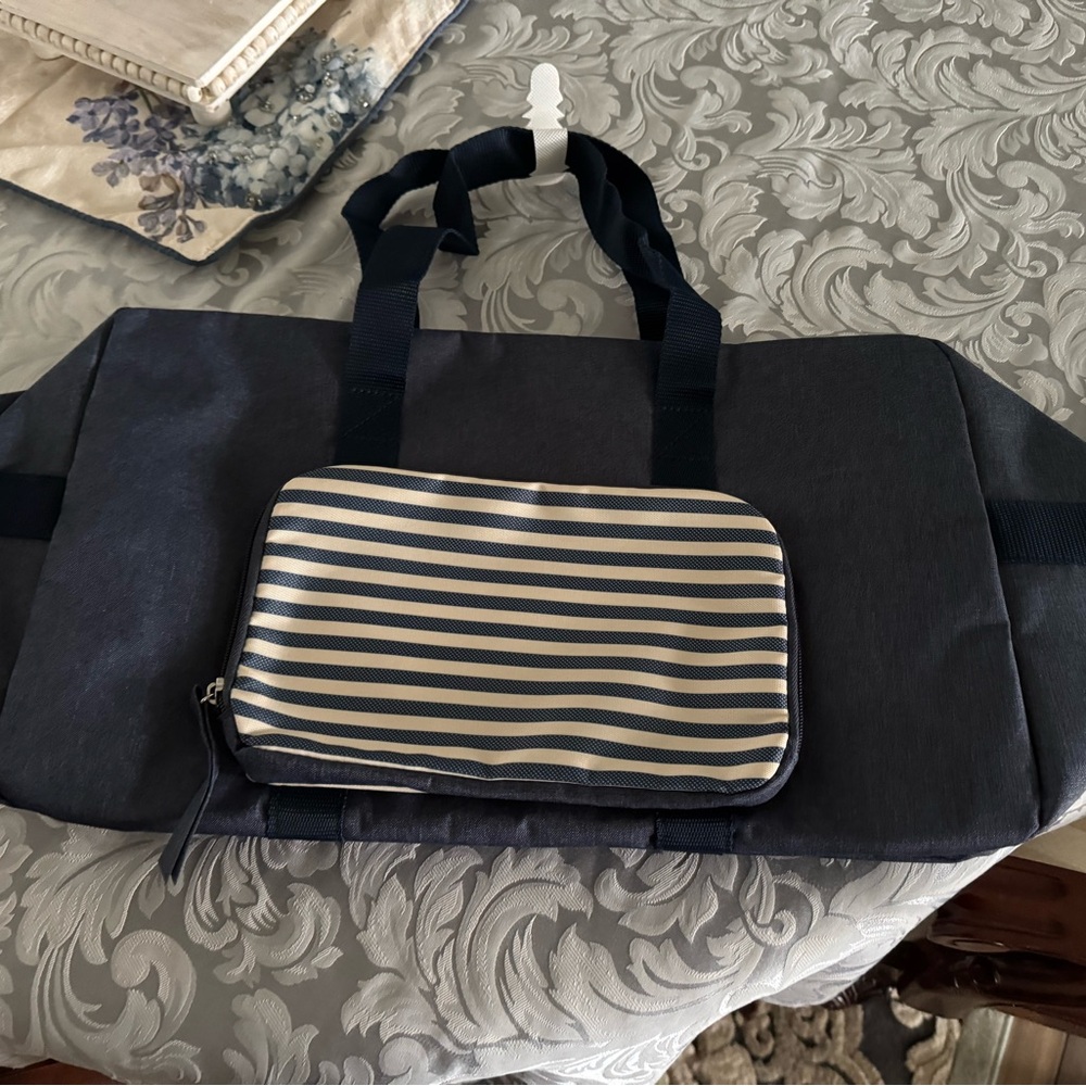 Brand new Navy and White Striped overnight bag
